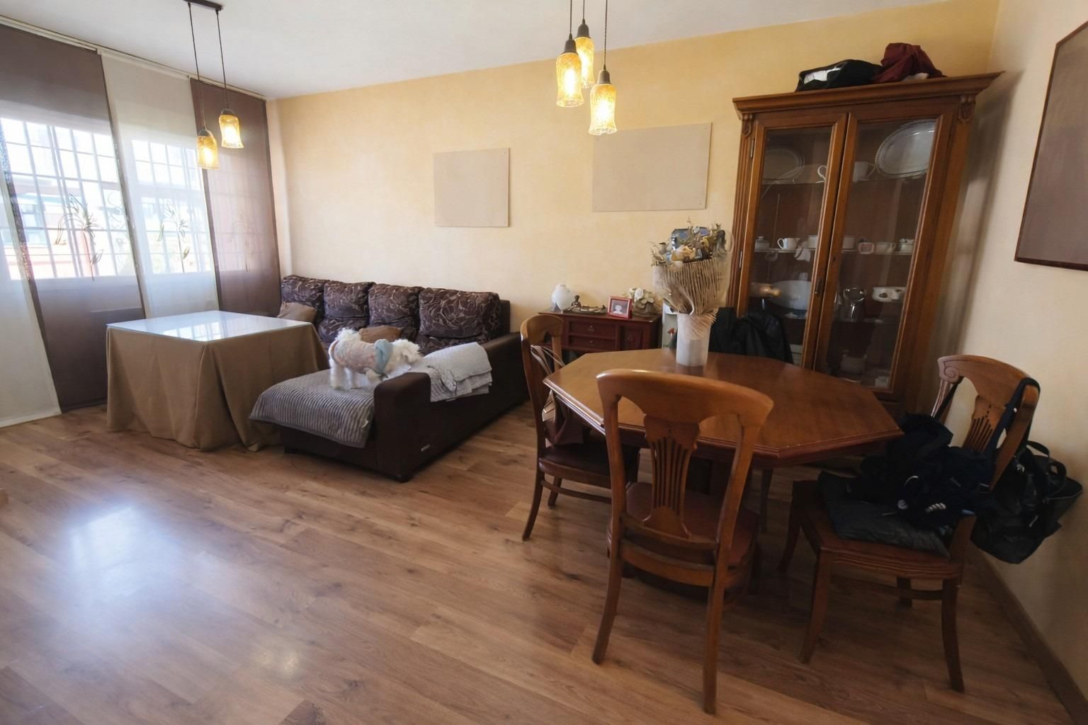 Sala de estar de Casa adosada en venta en Maracena con Trastero