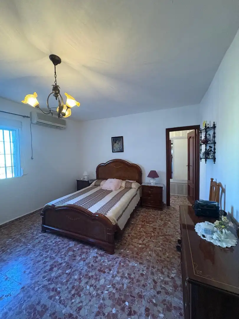 Dormitori de Casa o xalet en venda en Chiclana de la Frontera amb Aire condicionat, Jardí privat i Piscina