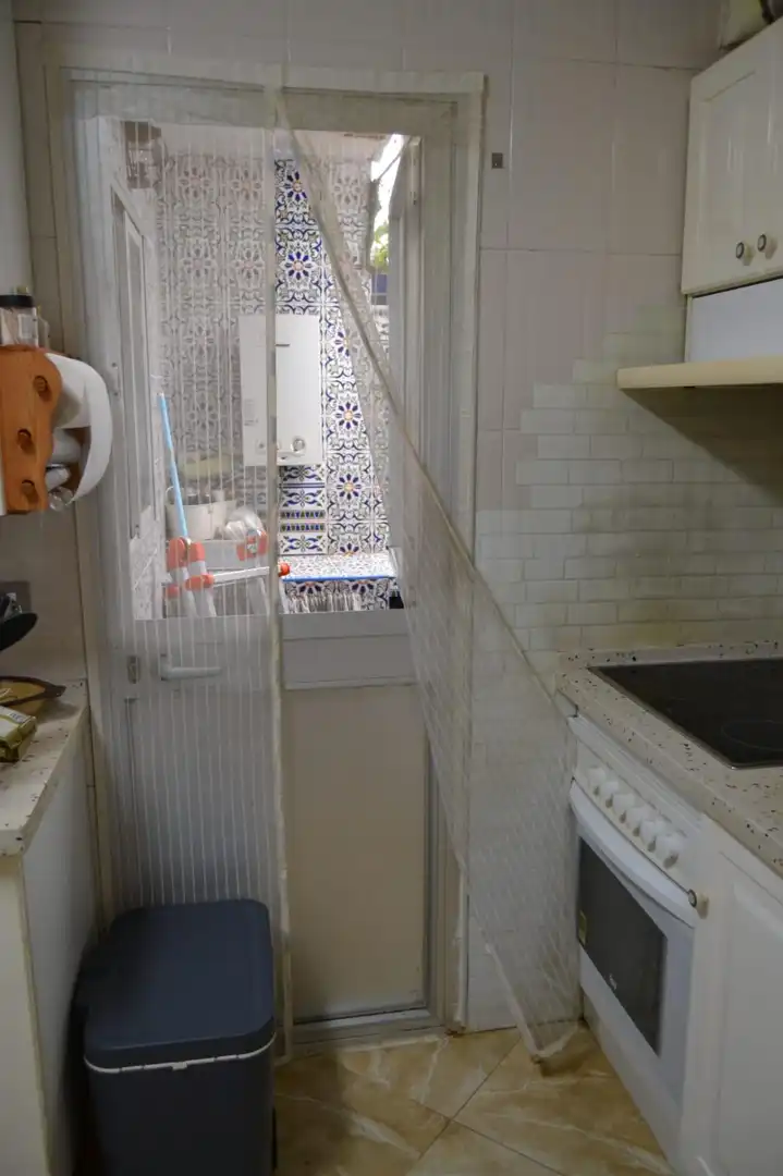 Cuina de Casa o xalet en venda en Málaga amb Calefacció, Terrassa i Moblat