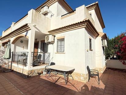 Exterior view of Single-family semi-detached for sale in Torrevieja  with Air Conditioner, Private garden and Terrace