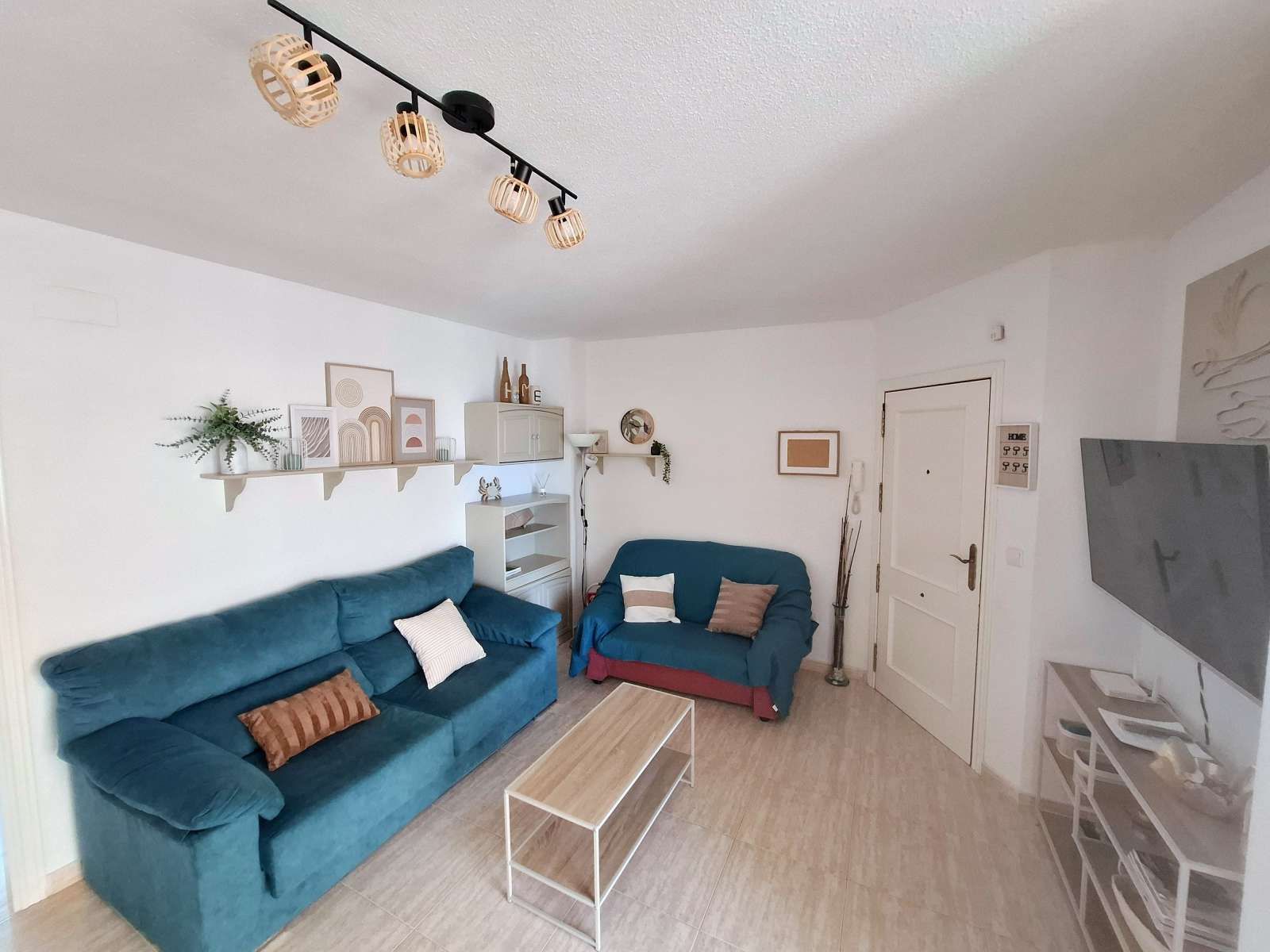 Sala d'estar de Apartament per a compartir en La Manga del Mar Menor amb Aire condicionat, Calefacció i Terrassa