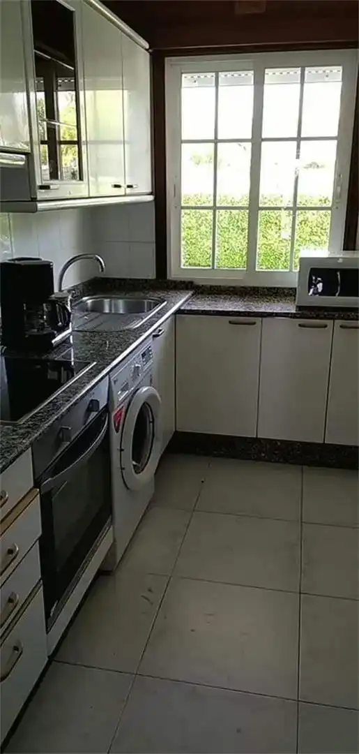 Cuina de Planta baixa en venda en Sanxenxo amb Piscina i Balcó
