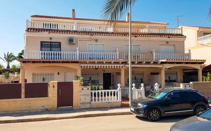 Exterior view of Single-family semi-detached for sale in Pilar de la Horadada  with Air Conditioner and Terrace