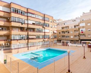 Swimming pool of Apartment for sale in Torrevieja  with Air Conditioner, Terrace and Balcony