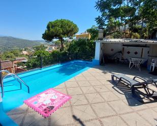 Swimming pool of Single-family semi-detached for sale in Argentona  with Air Conditioner, Heating and Private garden