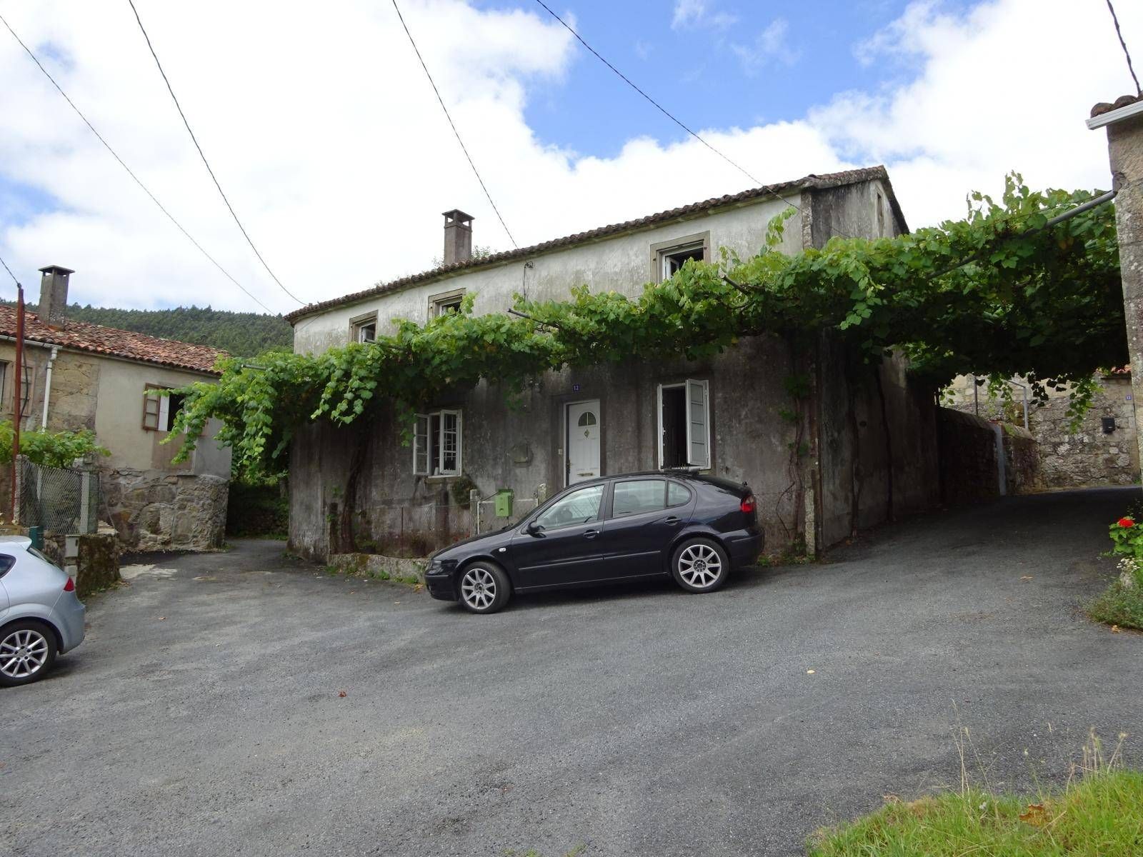 Vista exterior de Casa o xalet en venda en Brión amb Terrassa, Traster i Moblat