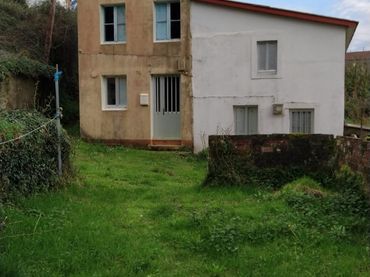 Casa amb jardí en venda a Figueiroa 18
