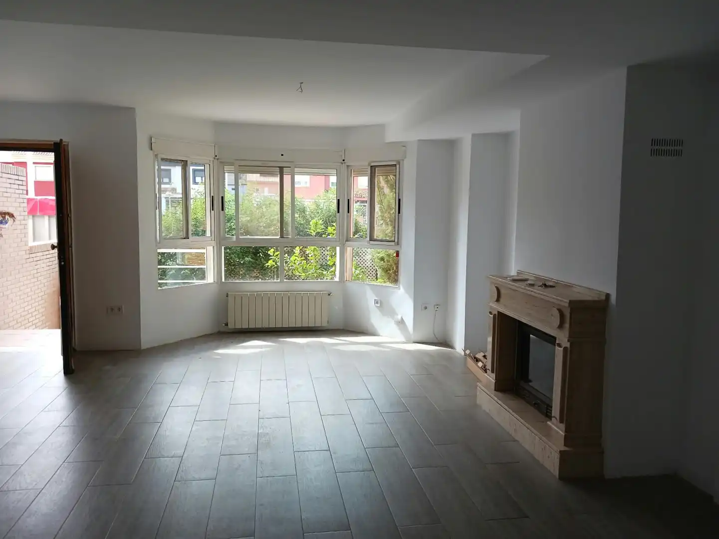 Sala de estar de Casa adosada en venta en Plaza Xúquer