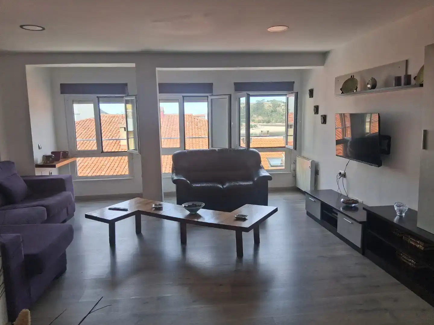 Sala d'estar de Apartament de lloguer en Ribadesella amb Parquet, Moblat i Forn