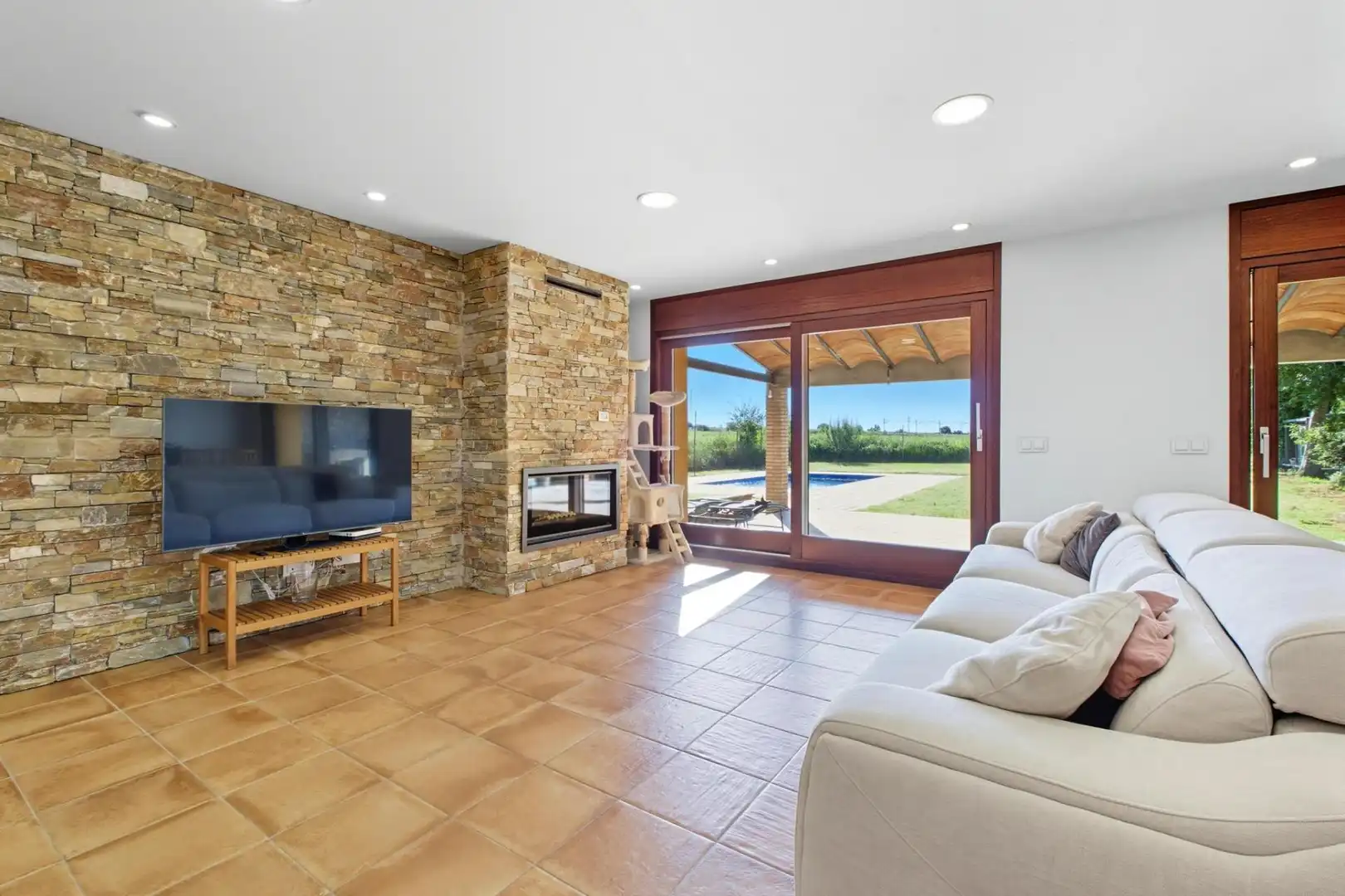 Living room of Country homes for sale in Garrigàs  with Private garden, Terrace and Swimming Pool