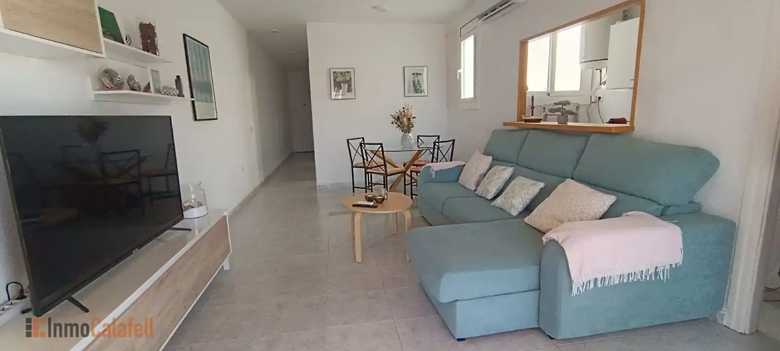 Wohnzimmer von Dachboden zum Verkauf in Calafell mit Klimaanlage, Heizung und Terrasse