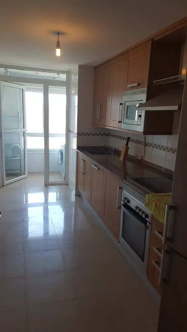 Cuina de Apartament en venda en Poio amb Calefacció, Terrassa i Traster