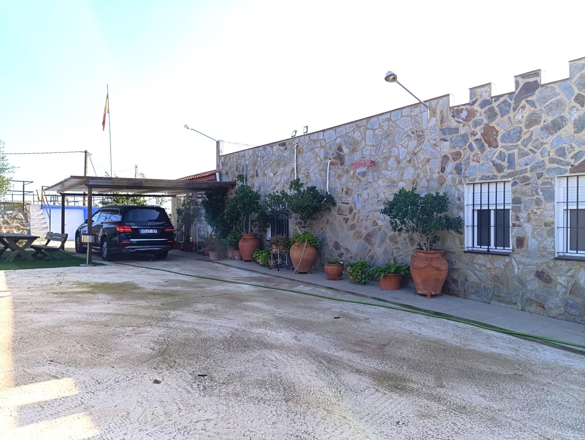 Exterior view of House or chalet for sale in Lora del Río  with Air Conditioner, Heating and Private garden