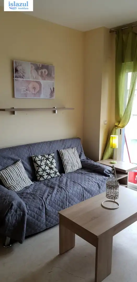 Habitación de Apartamento de alquiler en Isla Cristina con Aire acondicionado, Jardín privado y Terraza