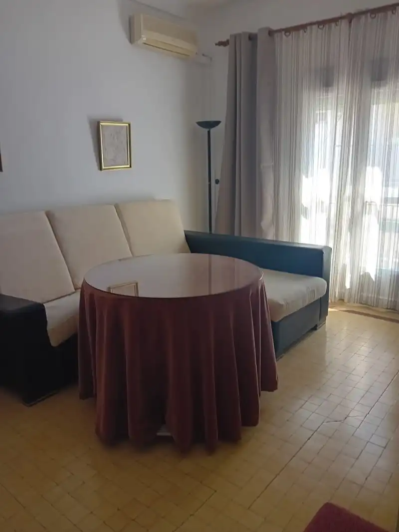 Sala d'estar de Pis de lloguer en Cáceres amb Jardí privat