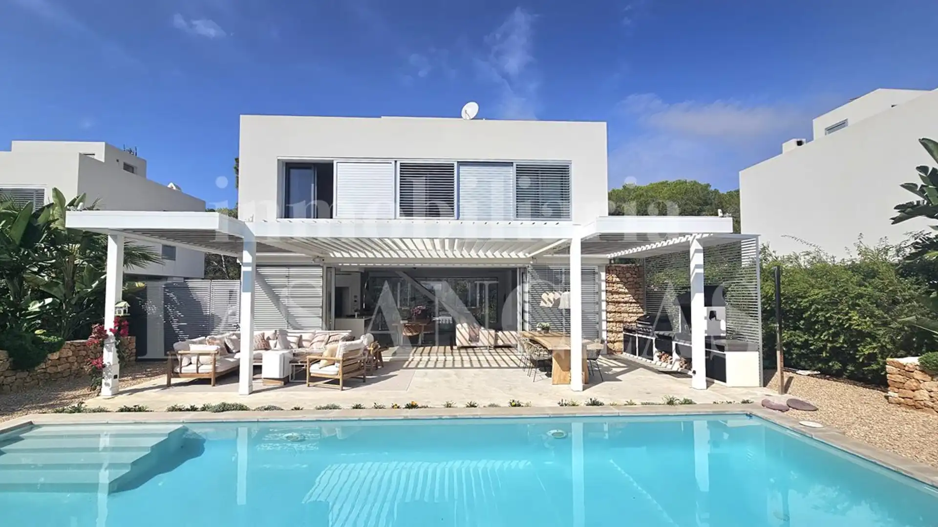 Exterior view of Houses for sale in Santa Eulària des Riu  with Heating, Terrace and Swimming Pool