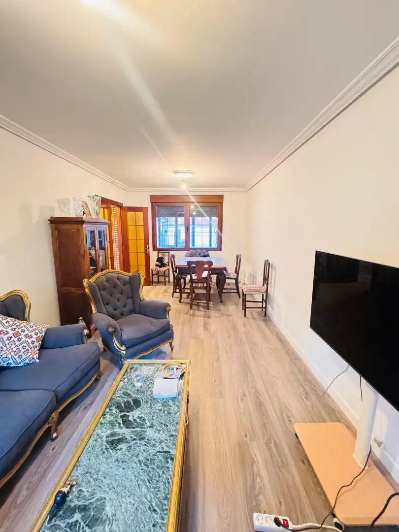 Sala de estar de Casa adosada en venta en Laguna de Duero con Calefacción, Jardín privado y Parquet