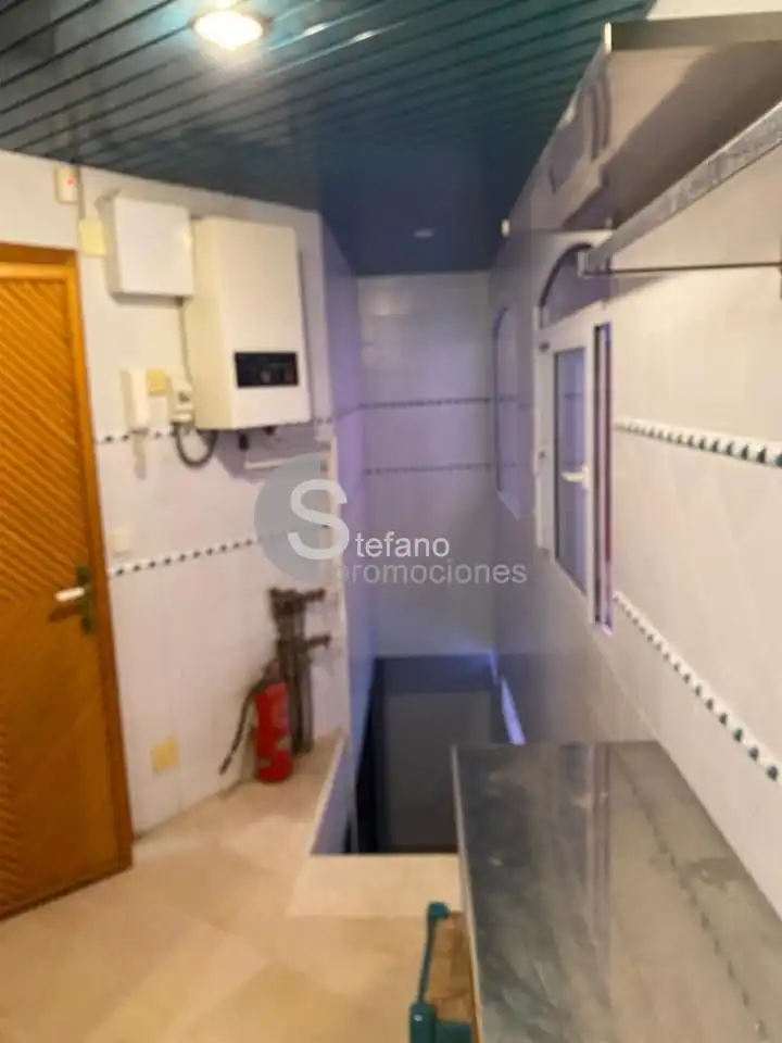 Cocina de Casa adosada de alquiler en Málaga con Aire acondicionado, Jardín privado y Terraza