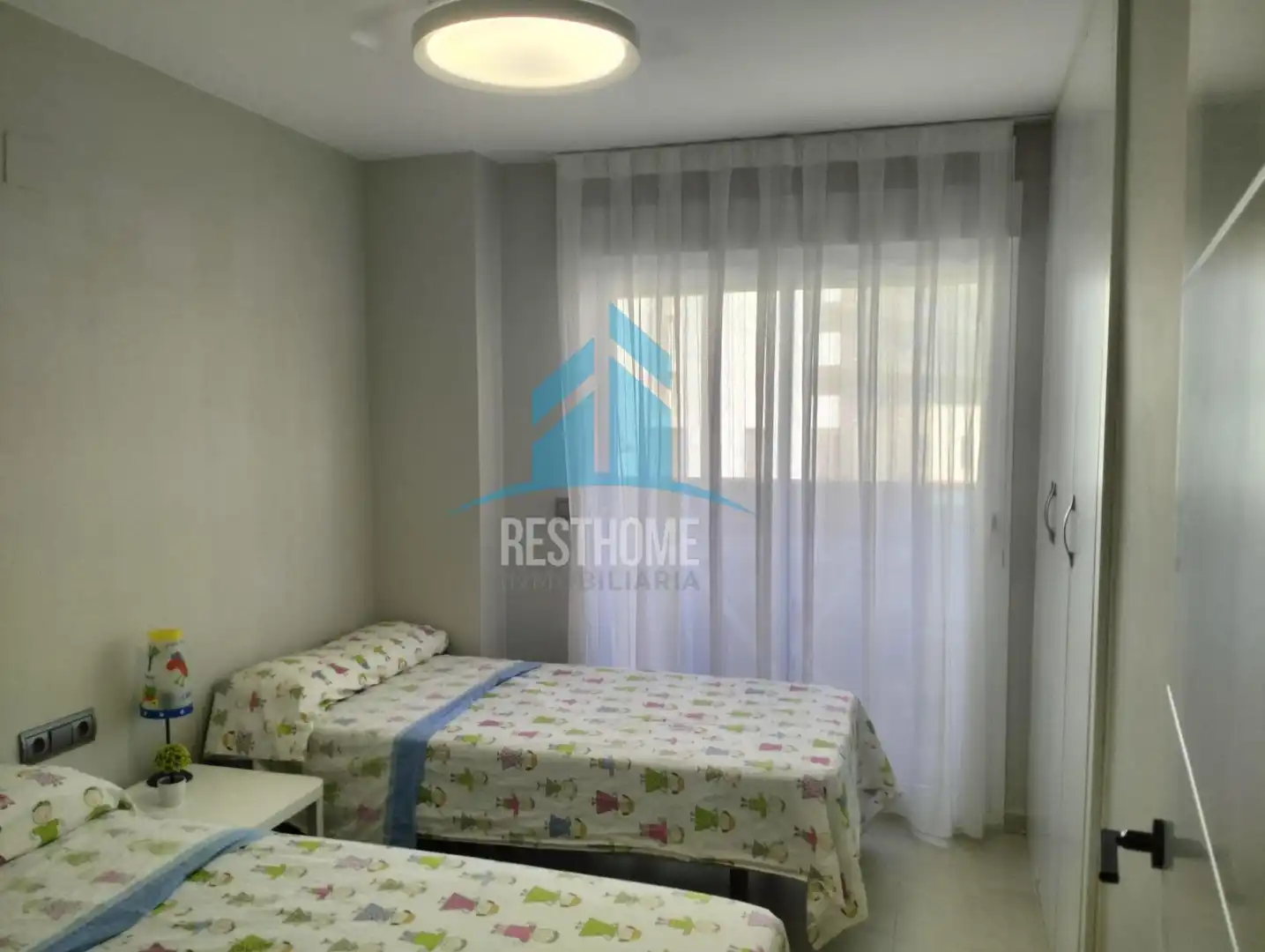 Habitación de Apartamento de alquiler en Cullera con Aire acondicionado, Jardín privado y Terraza