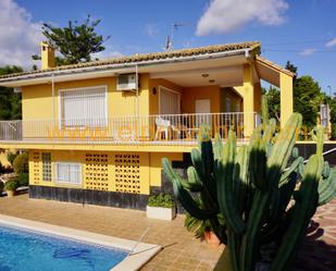 Vista exterior de Casa o xalet de lloguer en Torrent amb Aire condicionat, Terrassa i Piscina