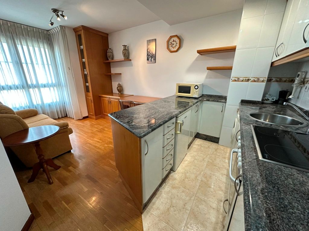 Kitchen of Apartment for sale in Gijón   with Heating, Parquet flooring and Storage room