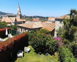 Jardí de Casa adosada de lloguer en Baiona amb Terrassa i Balcó