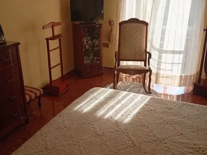 Dormitori de Casa adosada en venda en Motril amb Aire condicionat, Jardí privat i Moblat