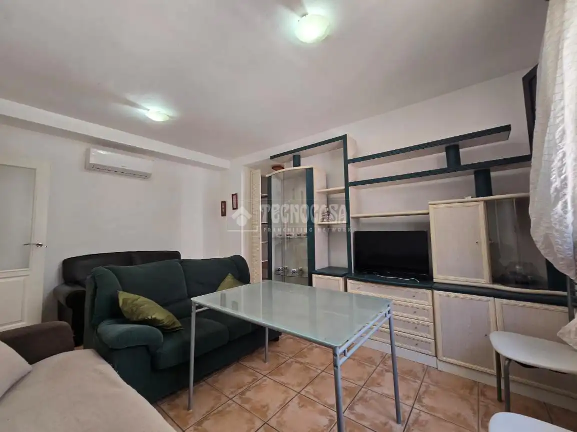 Sala de estar de Piso en venta en Vélez de Benaudalla con Aire acondicionado, Terraza y Piscina comunitaria