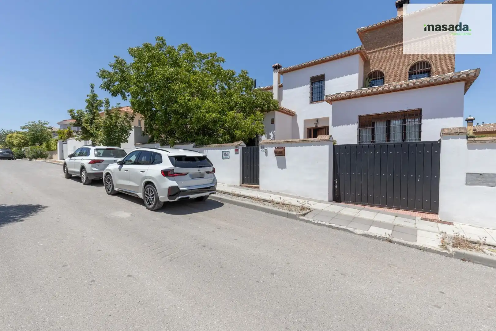 Vista exterior de Casa o chalet en venta en Vegas del Genil con Jardín privado, Piscina y Alarma