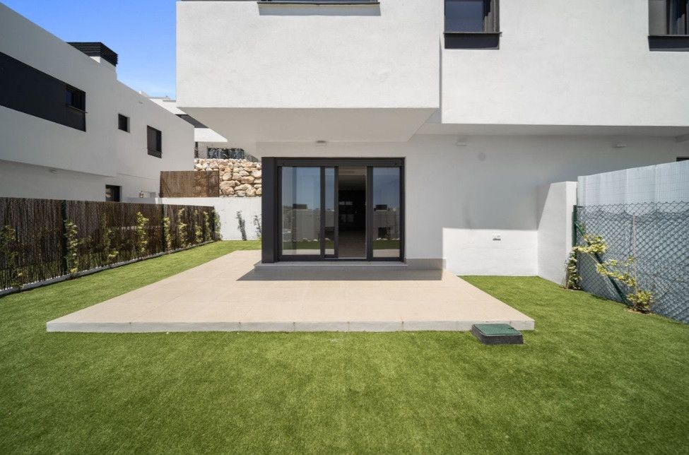 Exterior view of Single-family semi-detached for sale in Mijas  with Air Conditioner, Heating and Private garden