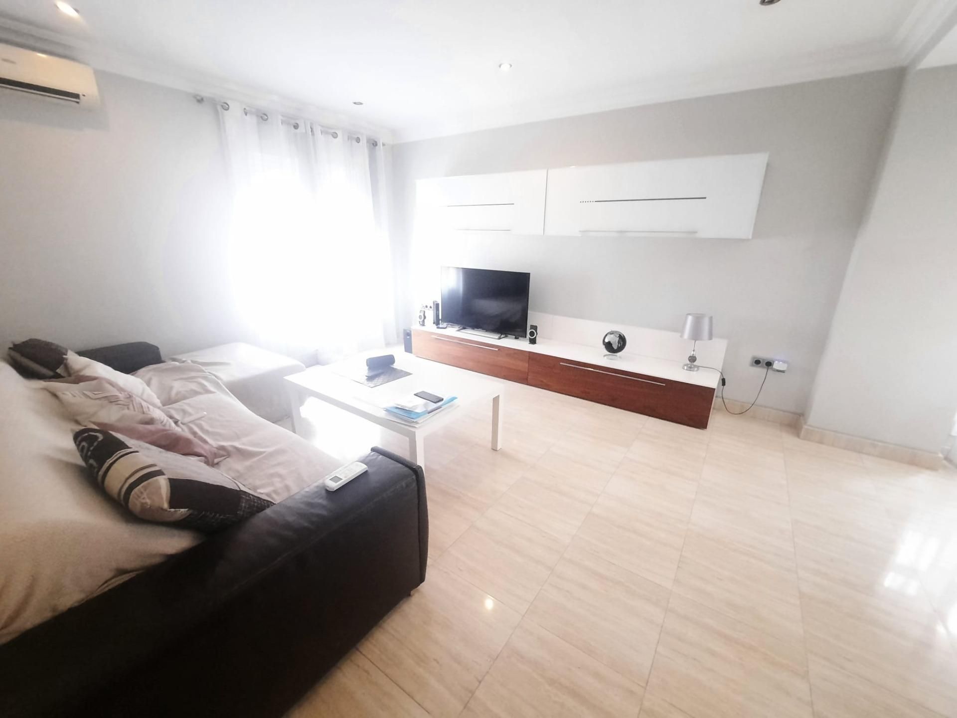 Sala de estar de Casa adosada en venta en Alzira