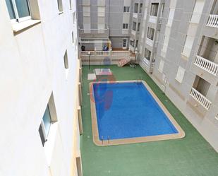 Swimming pool of Apartment for sale in Guardamar del Segura  with Air Conditioner, Terrace and Balcony