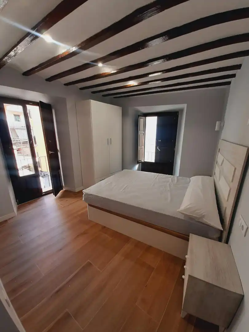 Dormitori de Apartament de lloguer en Úbeda amb Aire condicionat, Calefacció i Moblat