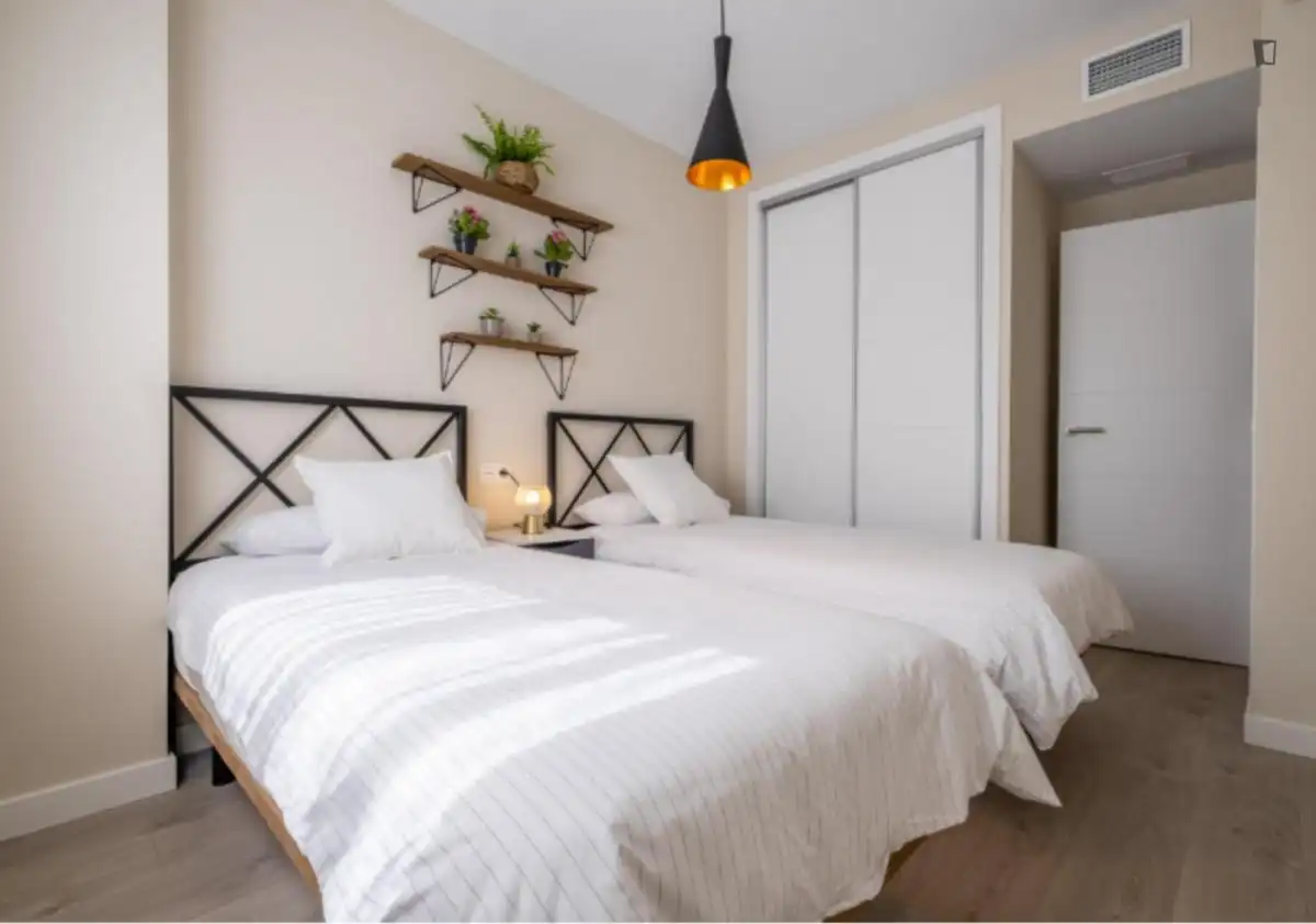 Dormitori de Apartament de lloguer en Málaga amb Aire condicionat, Moblat i Forn
