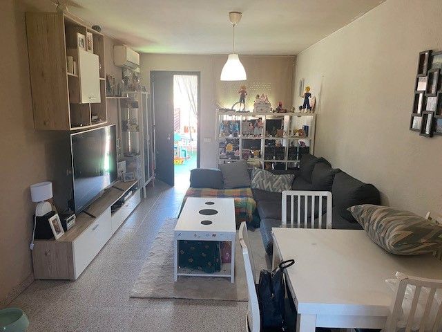 Living room of Single-family semi-detached for sale in Terrassa  with Air Conditioner, Storage room and Swimming Pool