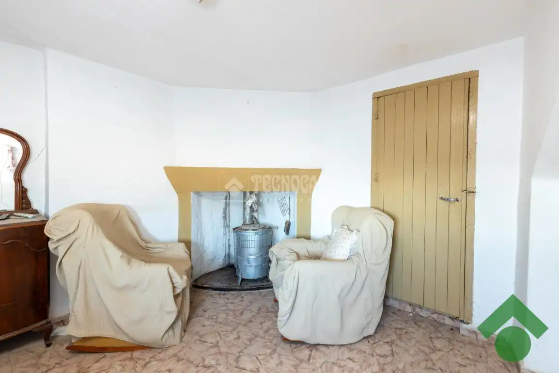 Sala de estar de Casa adosada en venta en Colomera con Terraza