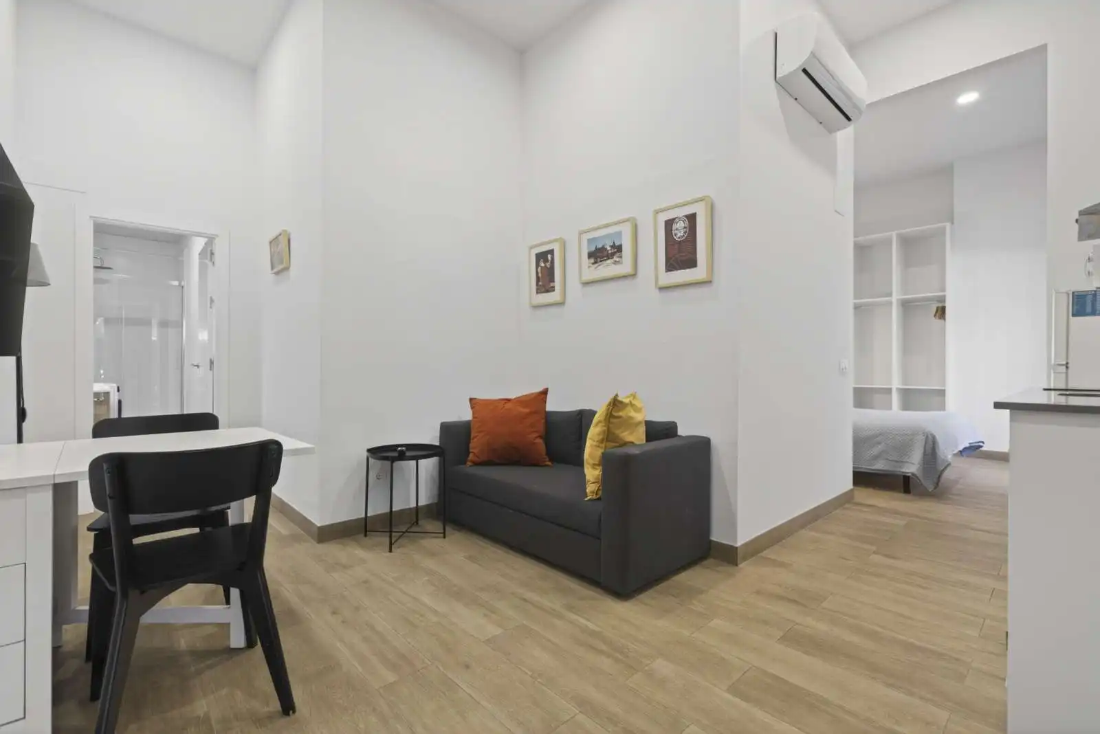 Sala de estar de Apartamento para compartir en Sevilla con Aire acondicionado, Terraza y Amueblado