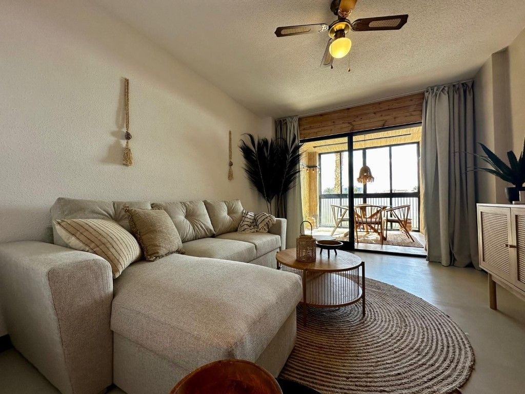 Sala d'estar de Apartament en venda en La Manga del Mar Menor amb Calefacció, Jardí privat i Terrassa