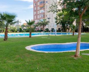 Piscina de Pis de lloguer en La Pobla de Farnals amb Piscina