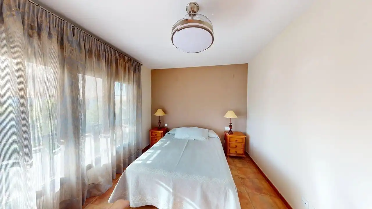 Habitación de Casa adosada de alquiler en Guillena con Aire acondicionado, Calefacción y Jardín privado