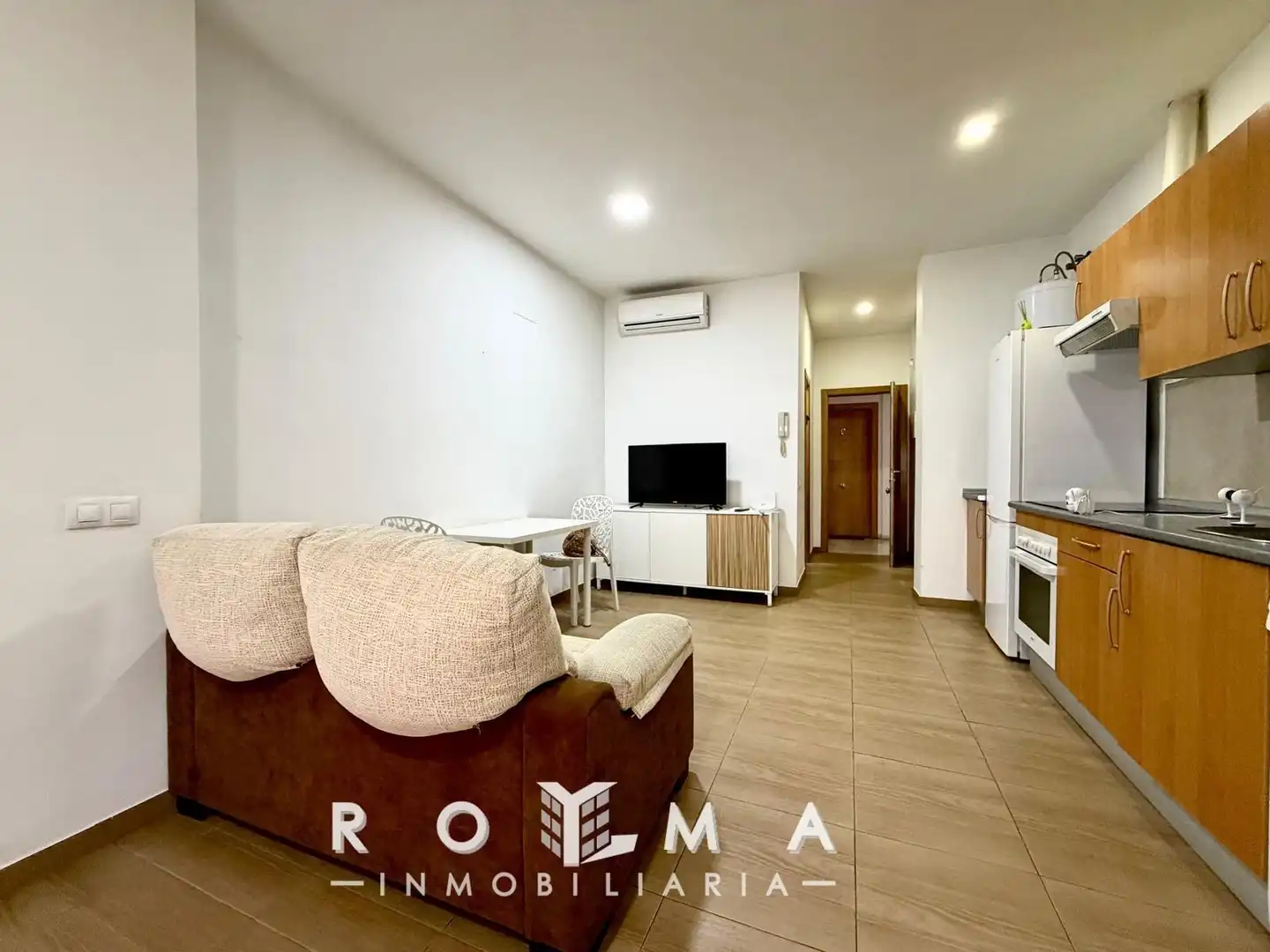 Sala d'estar de Estudi en venda en Dos Hermanas amb Aire condicionat, Traster i Piscina comunitària