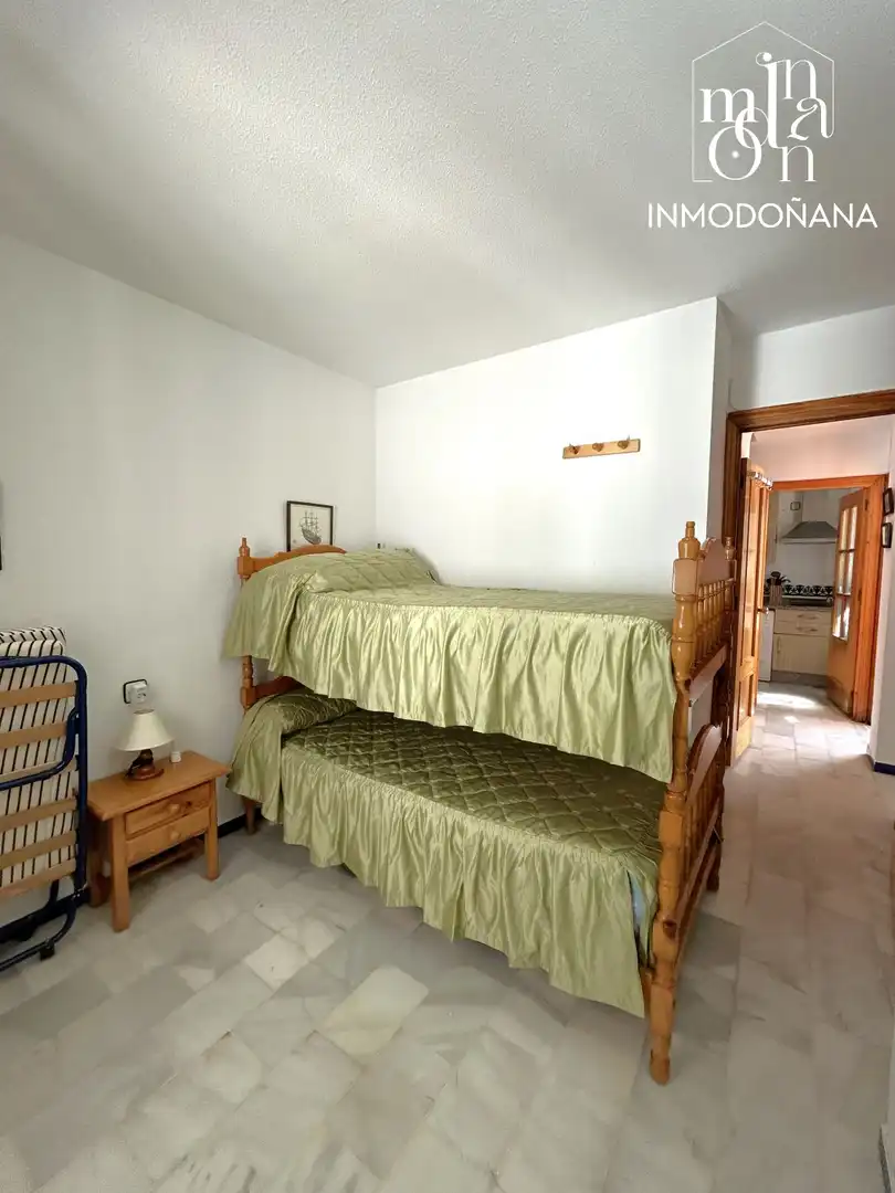 Habitación de Casa adosada en venta en Almonte con Terraza, Piscina y Amueblado