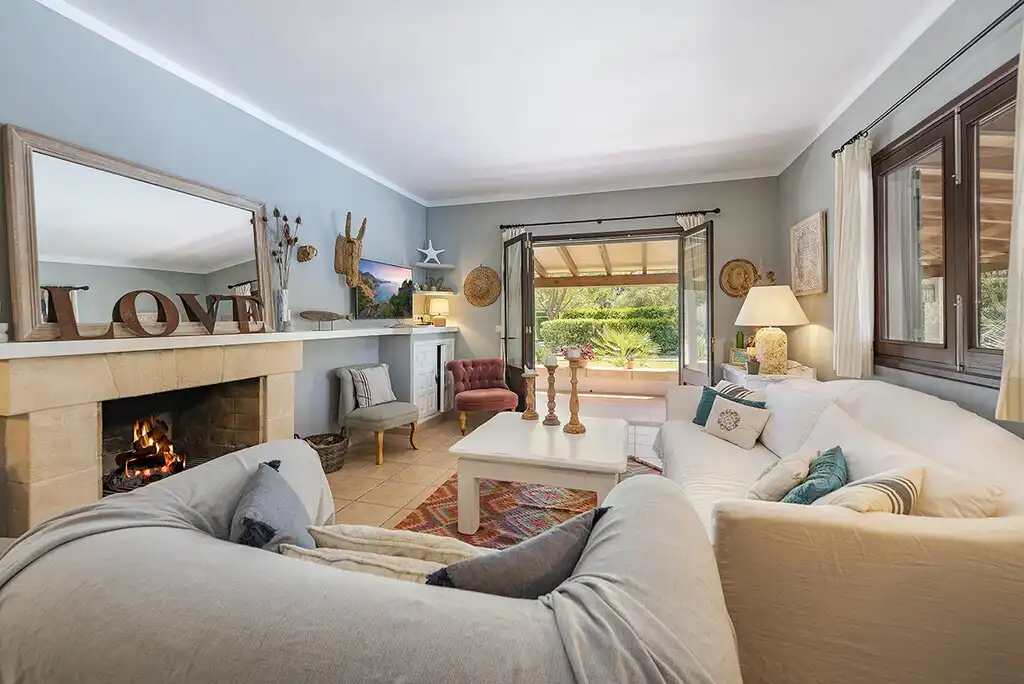 Sala d'estar de Finca rústica en venda en Pollença amb Aire condicionat, Jardí privat i Terrassa
