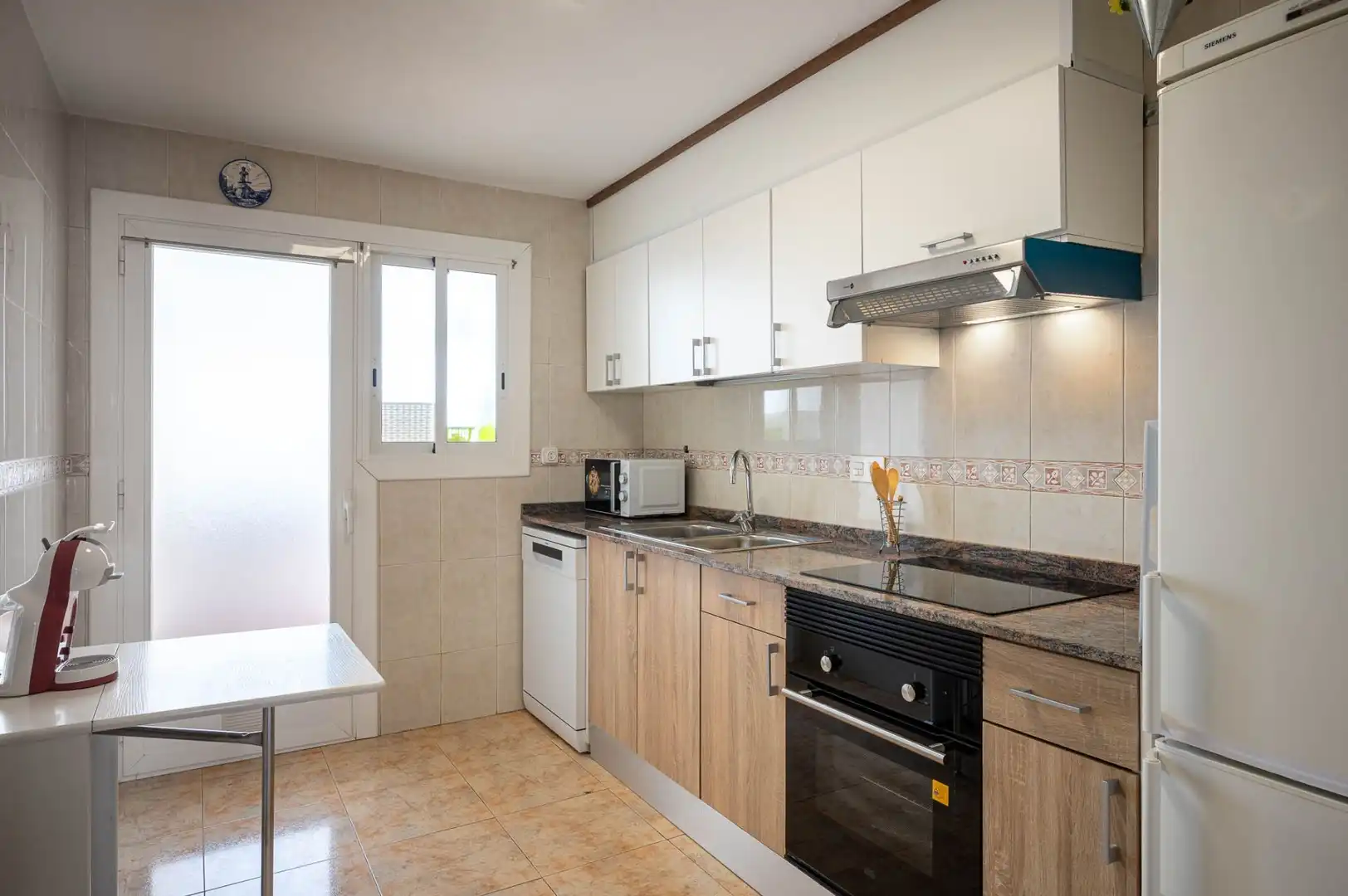 Cocina de Piso en venta en Torredembarra con Calefacción, Terraza y Piscina comunitaria