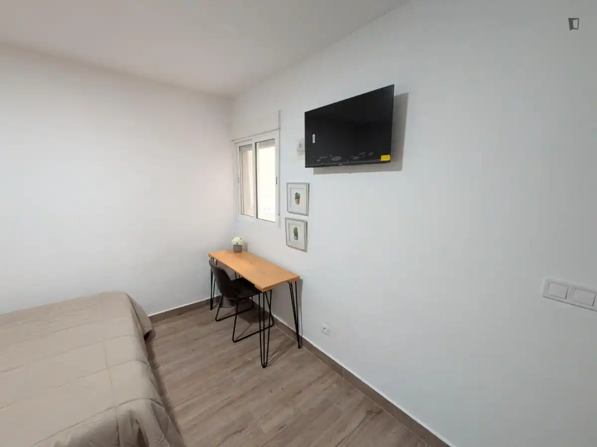 Dormitori de Casa o xalet per a compartir en Málaga amb Aire condicionat, Moblat i Rentadora