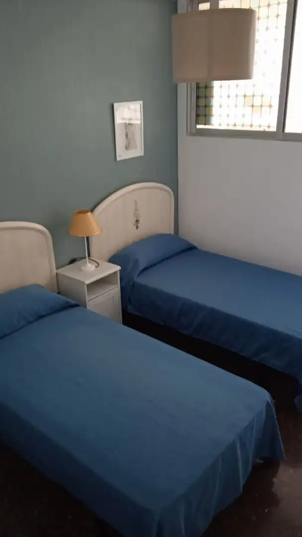 Dormitori de Apartament de lloguer en Sevilla amb Aire condicionat i Moblat