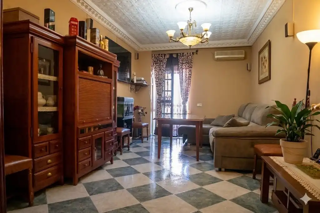 Sala de estar de Casa adosada en venta en Alcalá del Río con Aire acondicionado, Calefacción y Amueblado