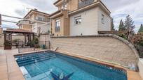 Swimming pool of House or chalet for sale in  Granada Capital  with Air Conditioner, Heating and Parquet flooring