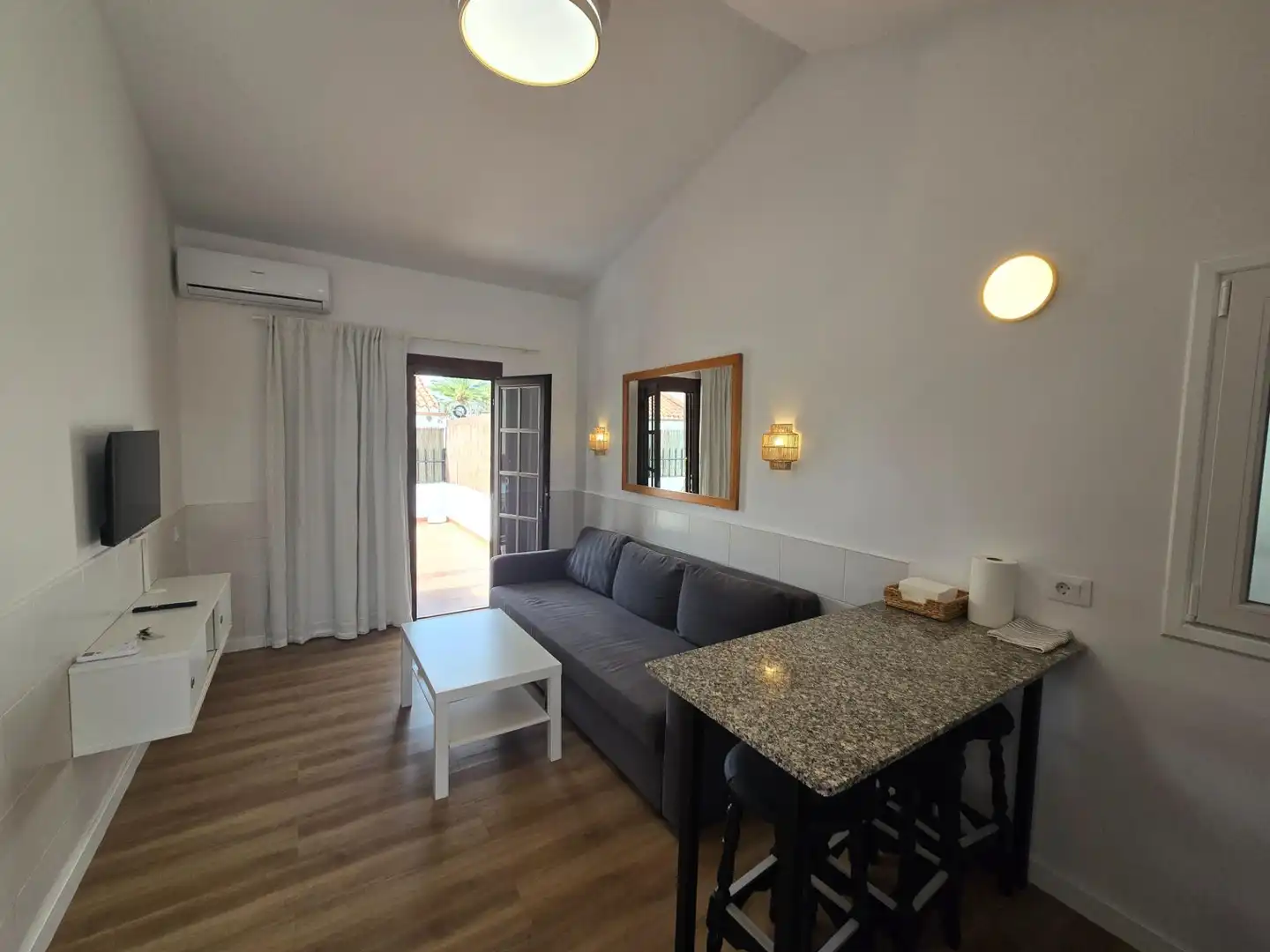 Sala d'estar de Casa o xalet de lloguer en San Bartolomé de Tirajana amb Aire condicionat, Terrassa i Moblat