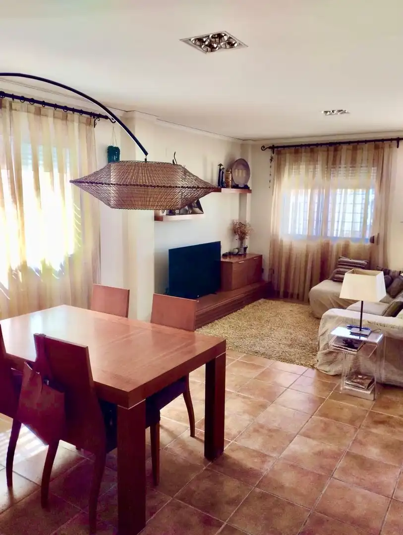 Sala d'estar de Casa adosada en venda en Cullera amb Aire condicionat, Calefacció i Jardí privat